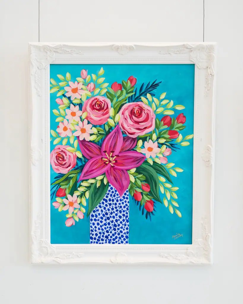 Colorful floral painting featuring pink roses, a purple lily, and small pink and white flowers in a blue and white patterned vase.