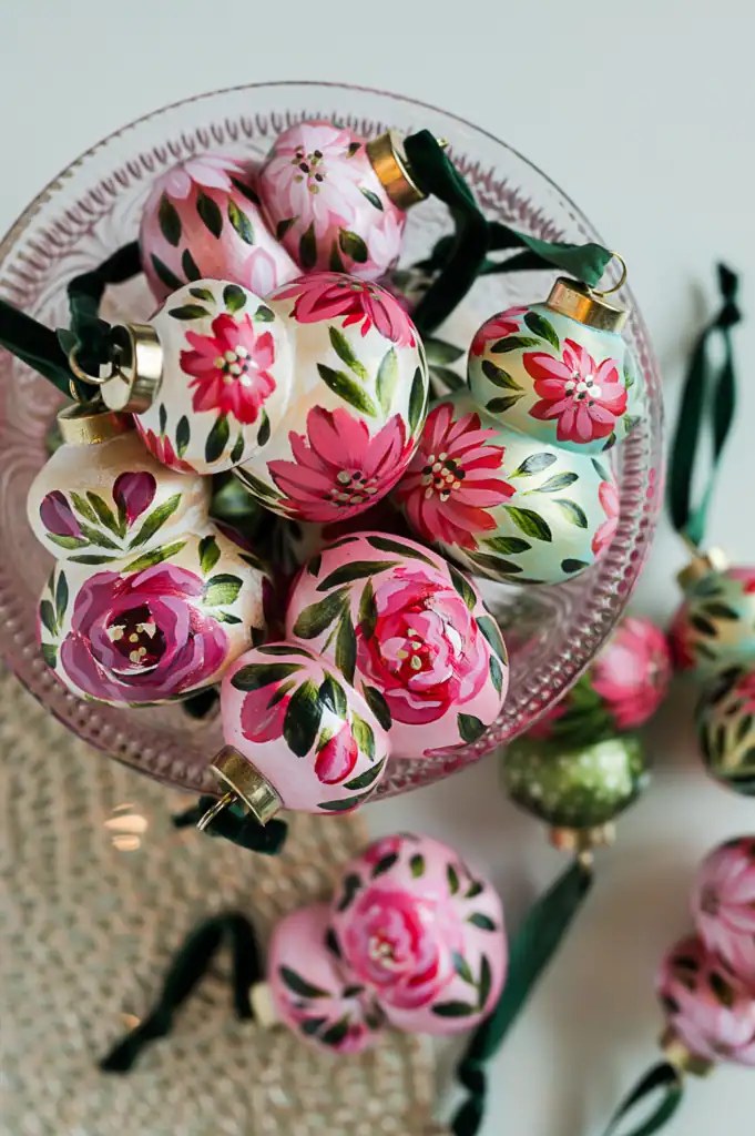 Bowl of pink floral hand painted ornaments, one of a kind Christmas baubles, artisan holiday decor and heirloom gifts.