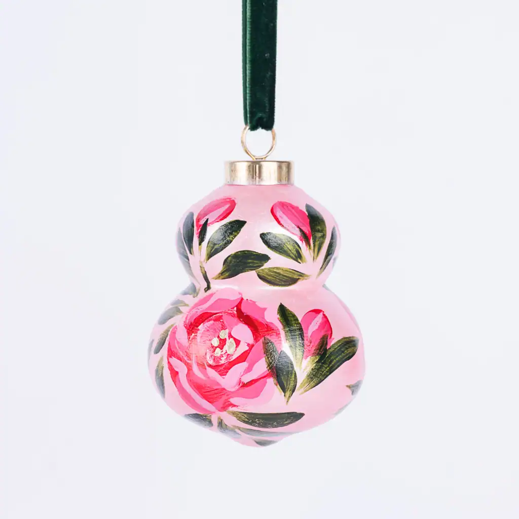 Hand painted floral Christmas ornaments with white flowers and greenery, artisan holiday decor, small batch designs by artist Bonnie Sorsby.