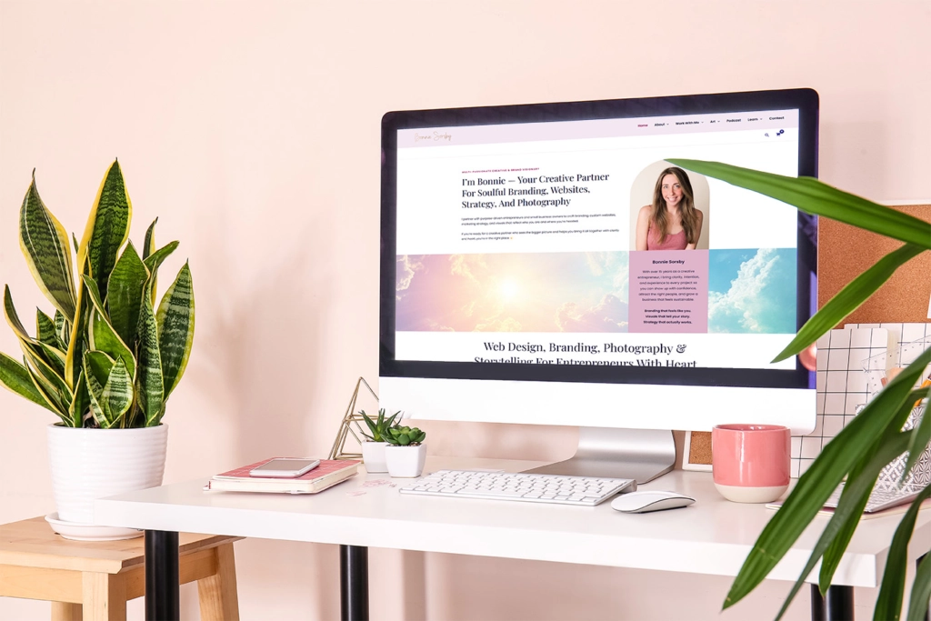 Desktop mockup displaying a custom artist website design with portfolio and branding elements for creatives.