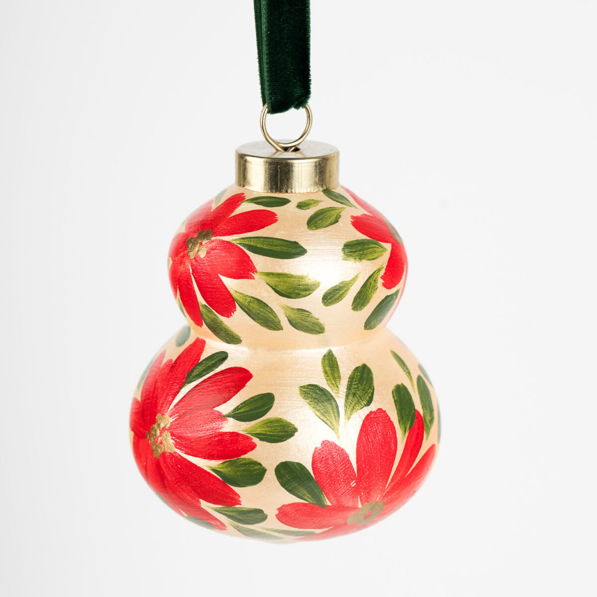 Vibrant red floral ornament with gold details; artist-painted in Florida, ideal for colorful living and bold modern holiday decor.