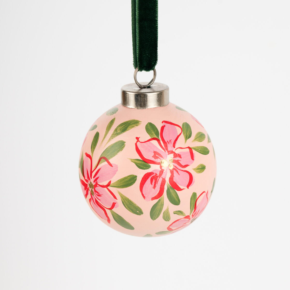 Vibrant red floral ornament with gold details; artist-painted in Florida, ideal for colorful living and bold modern holiday decor.