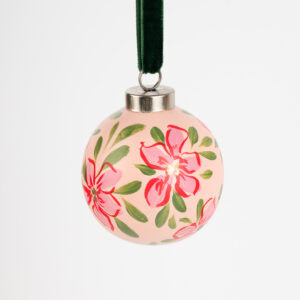 Vibrant red floral ornament with gold details; artist-painted in Florida, ideal for colorful living and bold modern holiday decor.