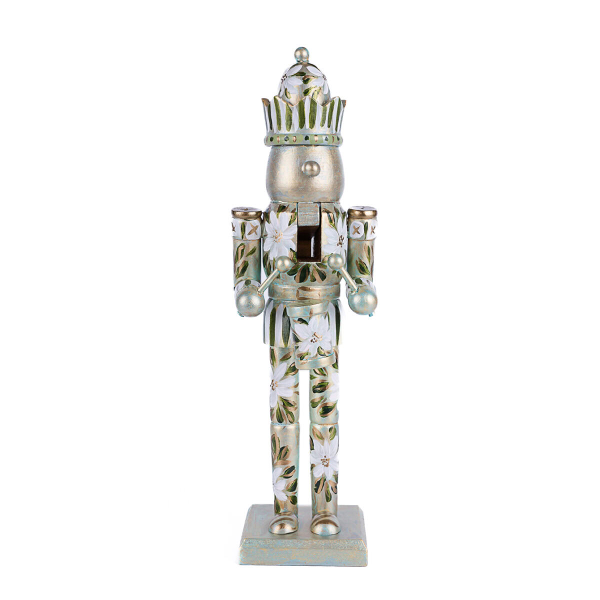 White floral nutcracker with gold and green hand-painted details; elegant neutral holiday decor by Florida artist.