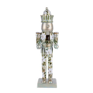 White floral nutcracker with gold and green hand-painted details; elegant neutral holiday decor by Florida artist.