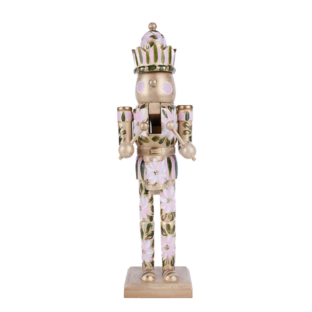 Blush pink floral nutcracker with soft green leaves and gold accents; boho holiday decor by Florida artist.
