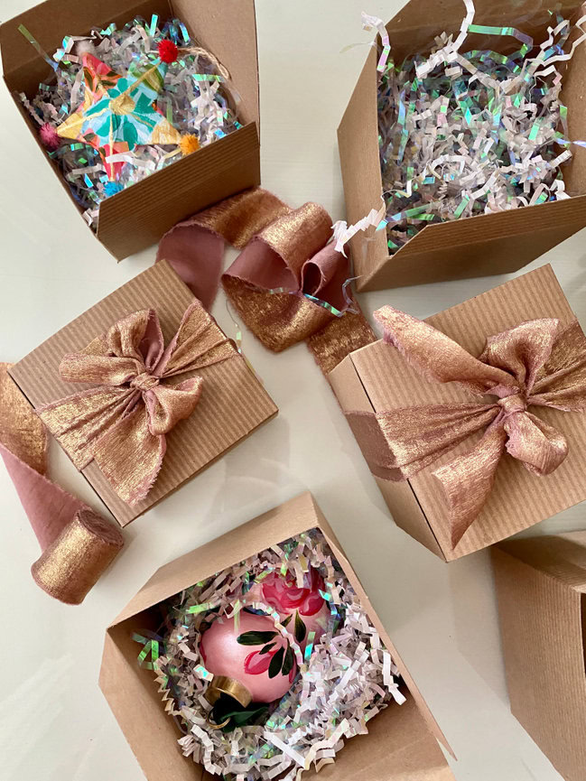 hand painted artisan ornaments in beautiful gift boxes with rose gold ribbon