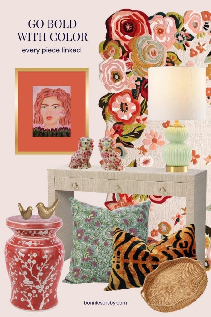 Colorful living room idea with a floral wool rug, a mint gourd lamp on a grasscloth console, floral spaniel figurines, a red garden stool with brass birds, block print and tiger velvet pillows, and Bonnie Sorsby’s painting Trust Your Gut in a gold frame with an orange mat